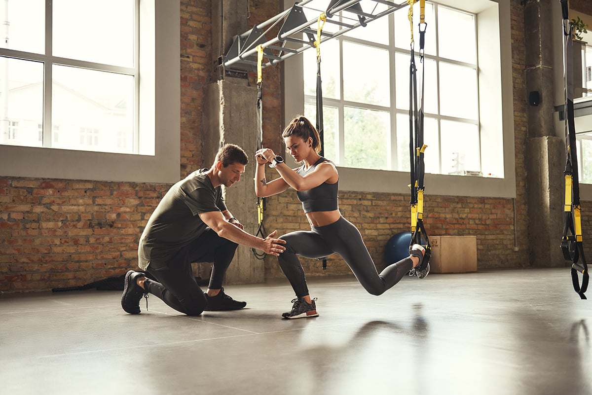 Personal Trainer stock-photo-doing-squat-exercise-confident-young-personal-trainer-is-showing-slim-athletic-woman-how-to-do-1457463062